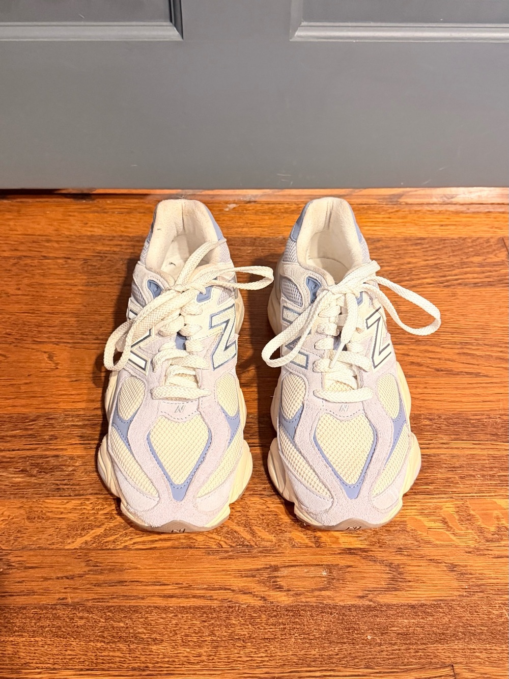 New Balance Cream with Light Blue Accent Athletic Sneakers